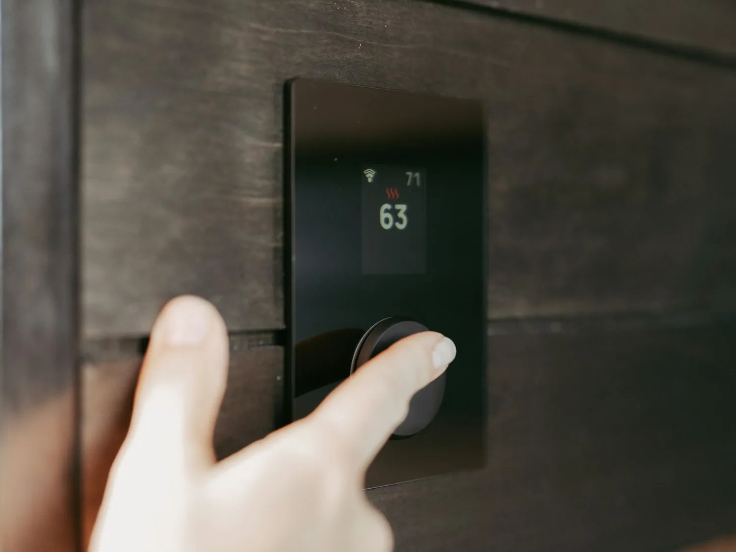 Smart home wall panel controlling lighting and heating